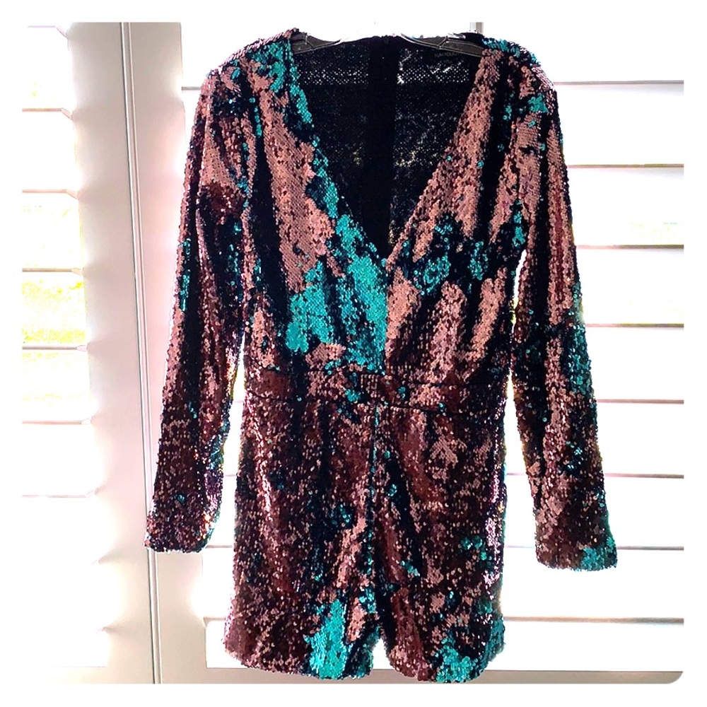 Romper with tags! Never worn! Amazing for party!